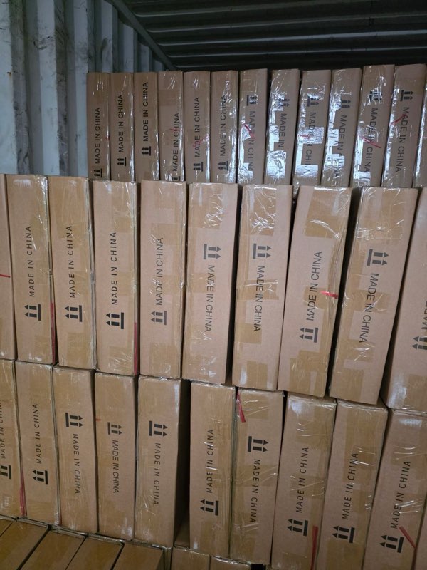 Cartons marked Made in China stacked tightly inside a container