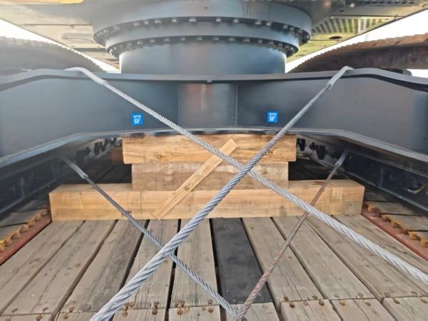 Timber blocking and steel-wire lashing.