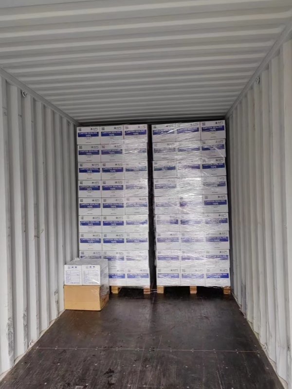 Palletized tape cartons in the container.